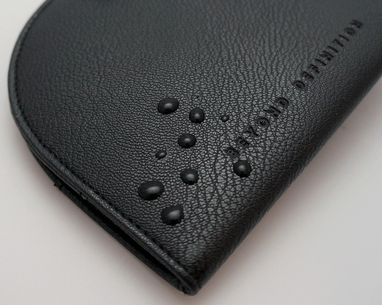 water droplets on surface of black ostomy case